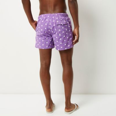 Purple star print swim shorts
